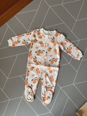 Petit lem orange patterned pajamas for baby